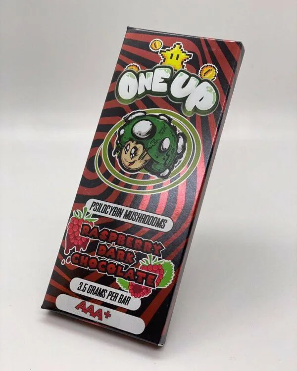 Indulge in One Up Raspberry Dark Chocolate—premium dark chocolate with raspberry and mushroom infusion for mood enhancement and creativity.